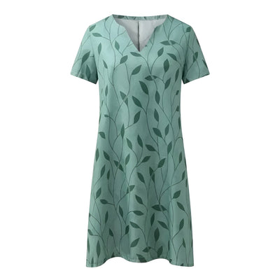 Sarela™ | Robe Élégante Cache-Bébé